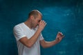 Cute man posing on blue background Royalty Free Stock Photo