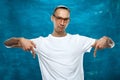 Cute man posing on blue background Royalty Free Stock Photo
