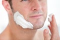 Cute man preparing to shave in the bathroom Royalty Free Stock Photo