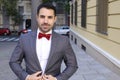 Cute man wearing red velvet bow tie Royalty Free Stock Photo