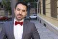 Cute man wearing red velvet bow tie Royalty Free Stock Photo