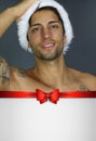 Cute man wearing a Santa hat Royalty Free Stock Photo
