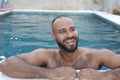 Cute Middle Eastern man swimming pool Royalty Free Stock Photo