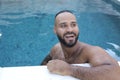 Cute Middle Eastern man swimming pool Royalty Free Stock Photo