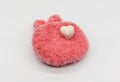 Cute Mini heart bath bomb on red fluffy carpet Royalty Free Stock Photo