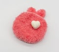 Cute Mini heart bath bomb on red fluffy carpet Royalty Free Stock Photo