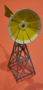 Cute miniature yellow toy windmill Royalty Free Stock Photo