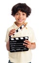 Cute Mixed Race Boy with Clapper Board. Royalty Free Stock Photo