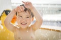 Cute Mixed Race Boy Having Fun at the Water Park Royalty Free Stock Photo