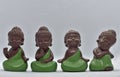 Four Chinese traditional little monk figure