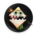 Cute monster sandwich on white background, top view. Halloween party food