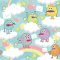 Cute monsters on clouds seamless texture. Royalty Free Stock Photo