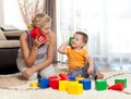 Cute mother and kid boy playing together Royalty Free Stock Photo