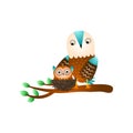 Cute mother owl stay on tree branch near the kid Royalty Free Stock Photo