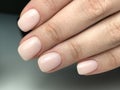 Cute natural nails with gel polish Royalty Free Stock Photo