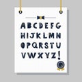 Cute navy blue doodle texture capital letters set on hanging white dotted pattern paper