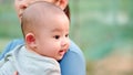 Cute, newborn Asian baby with smiling happy face. Royalty Free Stock Photo