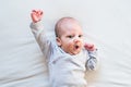 Cute newborn baby boy lying on bed, close up Royalty Free Stock Photo