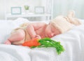 Cute newborn baby boy wearing knitted bunny costume Royalty Free Stock Photo