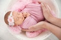 Cute newborn baby girl with her father on light background Royalty Free Stock Photo