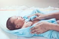 Cute newborn baby girl in towel after bath Royalty Free Stock Photo