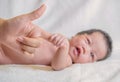 Cute newborn baby hand holding mother's finger Royalty Free Stock Photo