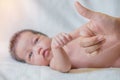 Cute newborn baby hand holding mother's finger Royalty Free Stock Photo