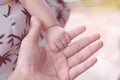 Cute newborn baby hand holding mother's finger Royalty Free Stock Photo