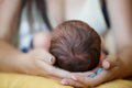 Cute newborn baby sleeps in the arms of my mother Royalty Free Stock Photo