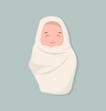 Cute newborn baby smile wrapped in cloth