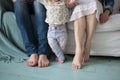 Cute newborn foot with family members