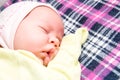 A cute newborn little baby girl sleeping. Royalty Free Stock Photo