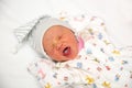 A cute newborn little baby girl sleeping. Royalty Free Stock Photo