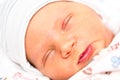 A cute newborn little baby girl sleeping. Royalty Free Stock Photo