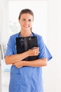 Cute nurse holding a folder Royalty Free Stock Photo