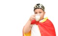 Cute obese boy drinking milk isolated