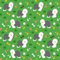 Cute Old English Sheepdog puppy in the grass seamless pattern background with hand drawn bones, balls and flowers.