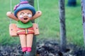 Cute old woman clay doll decorate in the garden Royalty Free Stock Photo