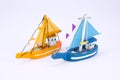 Cute old wooden blue and orange fishing boat isolated