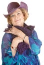 Cute Older Woman in Purple Hat Royalty Free Stock Photo