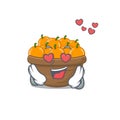 Cute orange fruit basket cartoon character showing a falling in love face Royalty Free Stock Photo