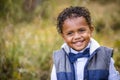 Cute outdoor portrait of a smiling African American young boy Royalty Free Stock Photo