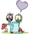 Cute owls on love watering can Royalty Free Stock Photo