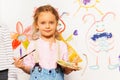 Cute painter with brush and pallet drawing picture Royalty Free Stock Photo