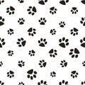 Cute paw seamless pattern, cat feet steps, pet design. Texture for wallpapers, fabric, wrap, web page backgrounds, vector Royalty Free Stock Photo