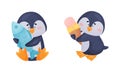 Cute Penguin Arctic Animal Holding Fish and Ice Cream Vector Set Royalty Free Stock Photo