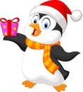 Cute penguin cartoon holding present Royalty Free Stock Photo