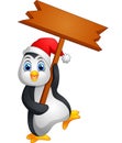 Cute penguin holding blank sign Royalty Free Stock Photo