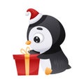 Cute penguin in Santa hat with gift box. Adorable funny baby bird cartoon character. New year and Christmas design Royalty Free Stock Photo