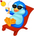 Cute penguin sitting on beach chair